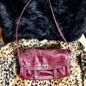 Deep red snakeskin buckle purse